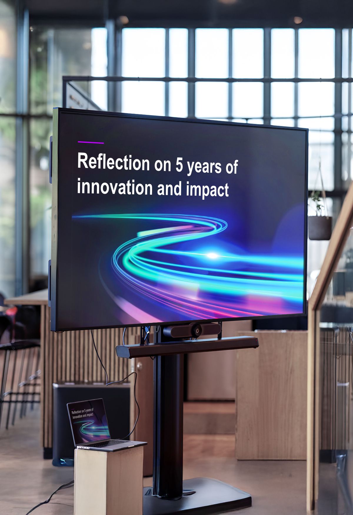 Display screen showing the AECO Innovation Lab five-year reflection presentation