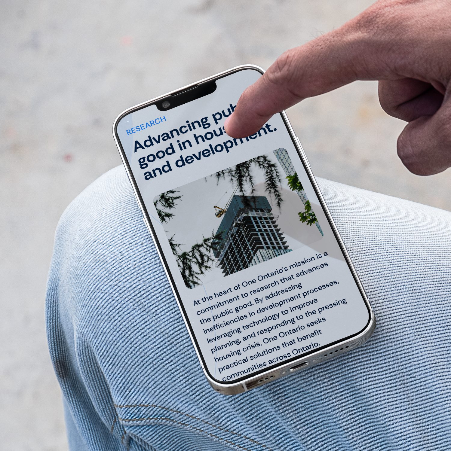 One Ontario mobile page held in hand
